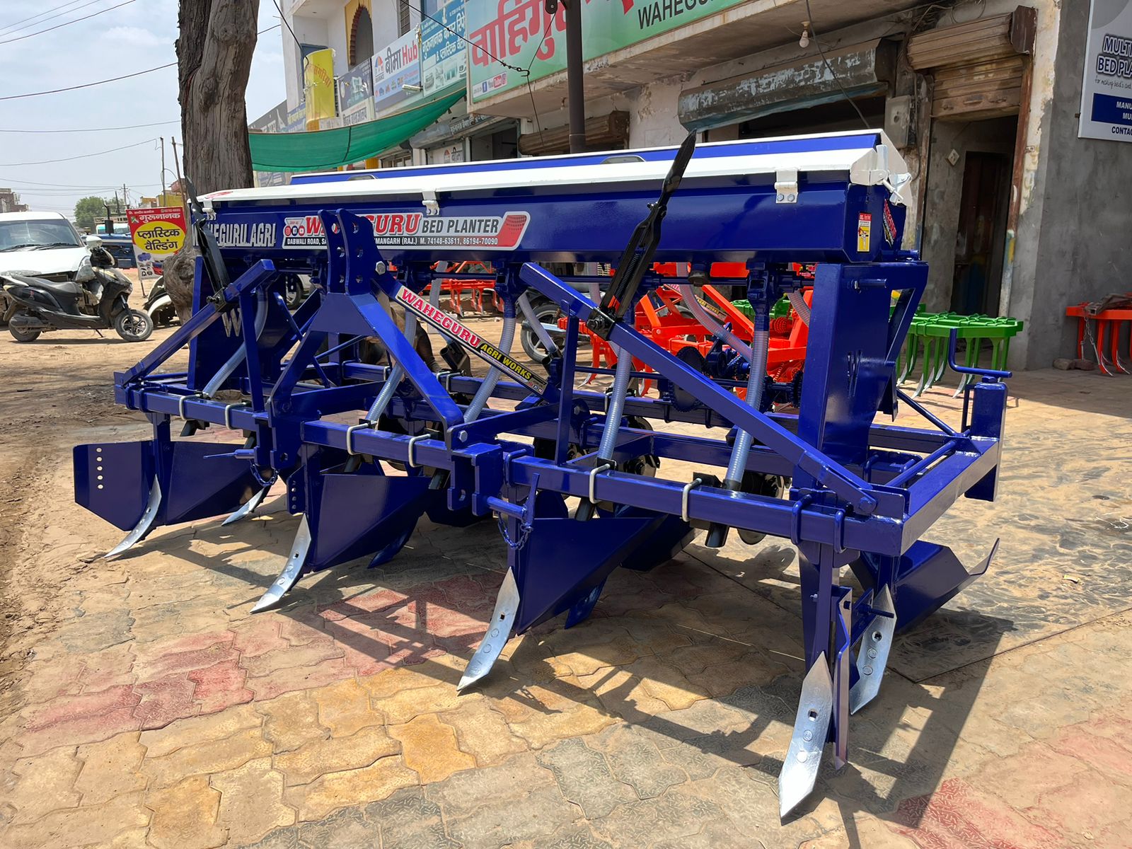 Raised  Bed  Planter with inclined  plate  metering  and shaper  attachment